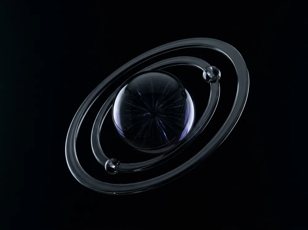 Glass sphere with orbiting rings
